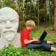 A statue of Lenin relocated to Gruto Park, a sculpture garden of discarded Soviet-era statuary in Lithuania. Photo via Getty Images.